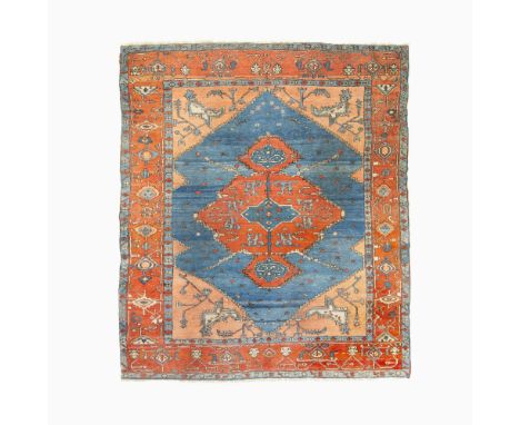 Turkey, ContemporaryThe central water bug medallion on the open indigo field flanked by terracotta spandrels is within a madd