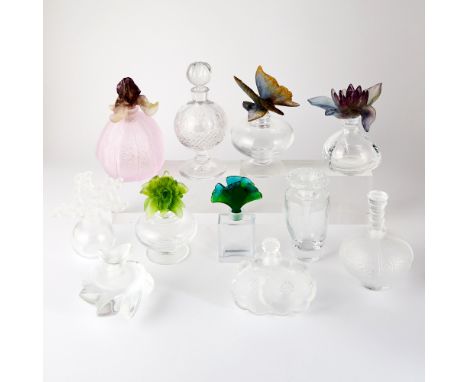 Including a Daum example with green stopper, Daum with purple flower, Daum pink example, Daum butterfly, Daum ginkgo leaf; an