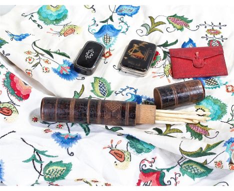 Victorian papier mache snuff box, a case, a needle case and two embroidered cloths and a red leather wallet  