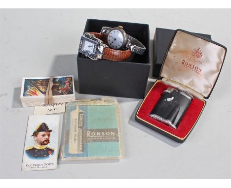 Silver ladies wristwatch, together with another watch, cigarette cards and a Ronson lighter