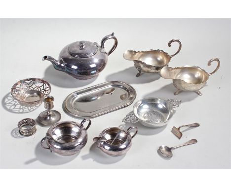 Silver plated wares, to include a pair of sauce boats, a tea pot, a basket. a candlestick, dish, spoon, etc, (qty)