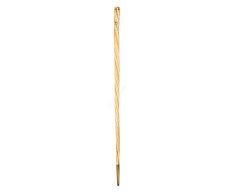 Ø A 19TH CENTURY GOLD-MOUNTED NARWHAL TUSK WALKING STICK with brass ferrule and strap plates, terminating in gold cap -- 34½i