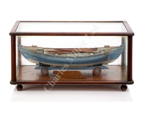AN HISTORICALLY INTERESTING LATE 19TH CENTURY MODEL OF THE TYNE LIFEBOAT OF 1833 the 17in. hull carved from the solid with si