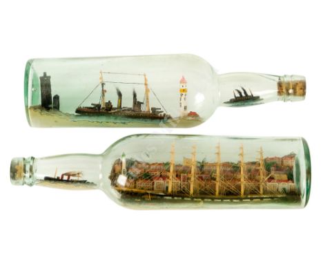 AN HISTORICALLY INTERESTING PAIR OF SHIPS IN BOTTLES MODELLED BY A GERMAN PRISONER ON THE ISLE OF MAN, 1917 the first depicti