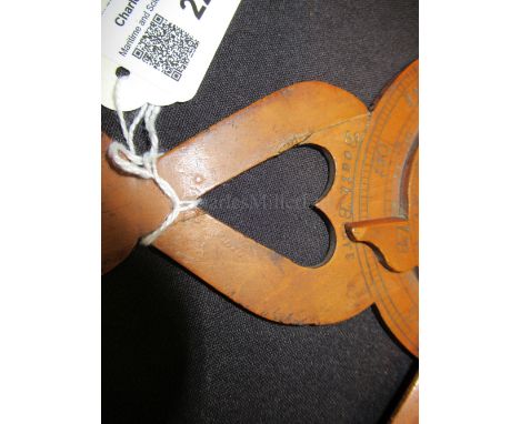 AN 18TH CENTURY NOCTURNAL constructed in fruitwood of typical form, inscribed Boath Bears by handle -- 9¾in. (25cm.) high; to