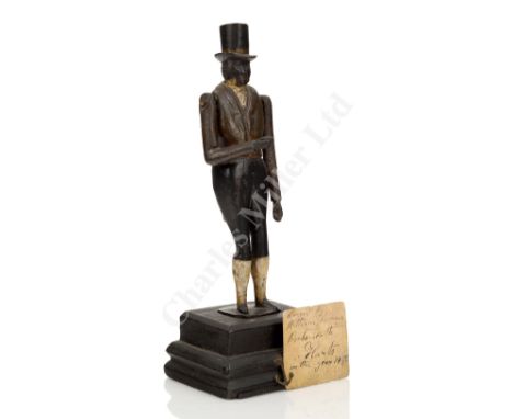 AN UNUSUAL ARTICULATED FIGURINE CARVED FROM TIMBER RECOVERED FROM H.M.S. ROYAL GEORGE , CIRCA 1842 modelled as an elegantly d