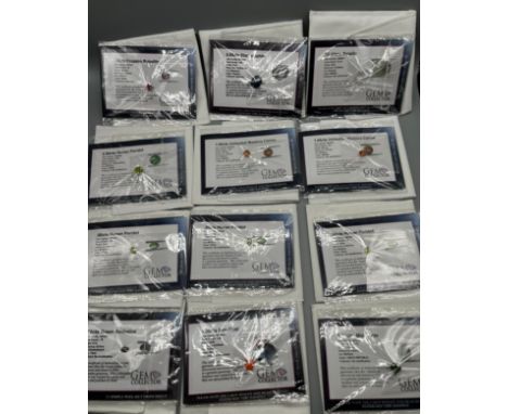 A Collection of 12 various gem stones with certificates; Fire opal, Hunan Peridot, star sapphire and various others. 