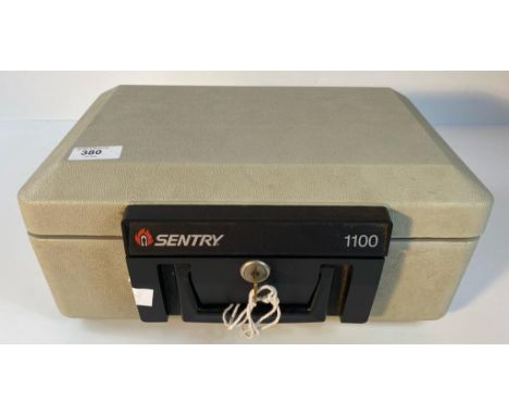 A sentry model 1100 security box with key [36x25cm] 