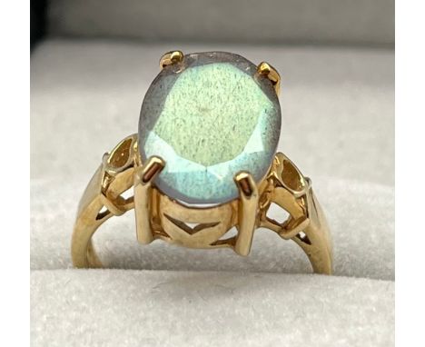 9ct yellow gold ring set with an oval cut gem stone. [Ring size N] [4.48Grams] 