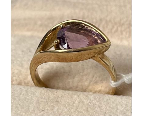 9ct yellow gold ring set with a pear drop amethyst stone. [Ring size R] [4.59Grams] 