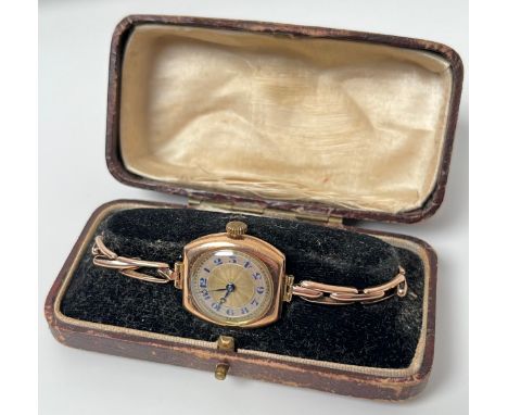 Vintage 9ct yellow gold ladies cocktail wristwatch by Texa. Gold, Mother of pearl and blue number dial. Comes with a box. 9ct