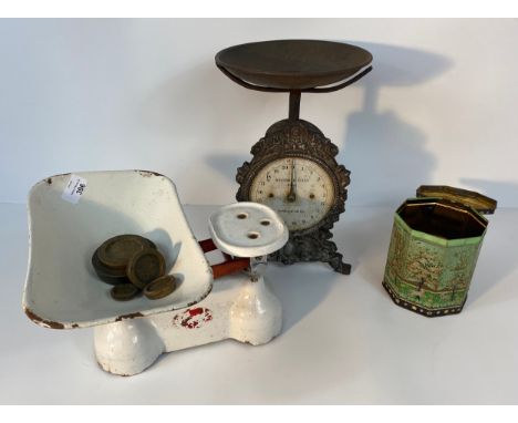 A set of antique household scales with weights along with enamel scales with weights [32.5cm] 