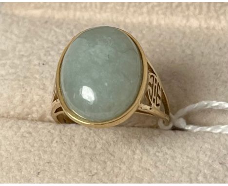 14ct yellow gold ring set with a jade cabochon gem stone. [Ring size N] [4.78Grams] 