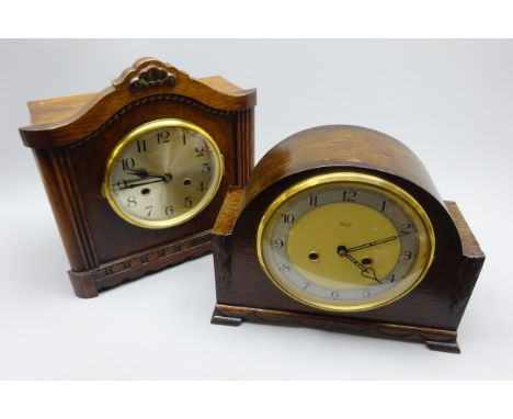 Smith Enfield mantel clock in arched oak case, silvered Arabic chapter and twin train movement striking the hours on a coil, 