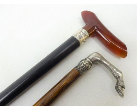 Late Victorian ebonised waling stick with cherry amber style handle and silver collar, Chester, 1897, L90cm and a Partridge w