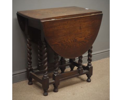 Early 20th century oval oak drop leaf table, gate action barley twist supports, W76cm, H77cm, L122cm Condition Report Click h