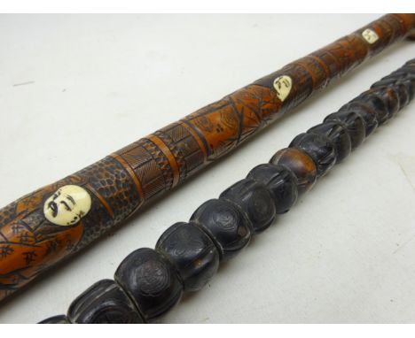 Chinese walking stick formed from a row of carved hardwood beads with horn handle L86cm and another Chinese walking stick car