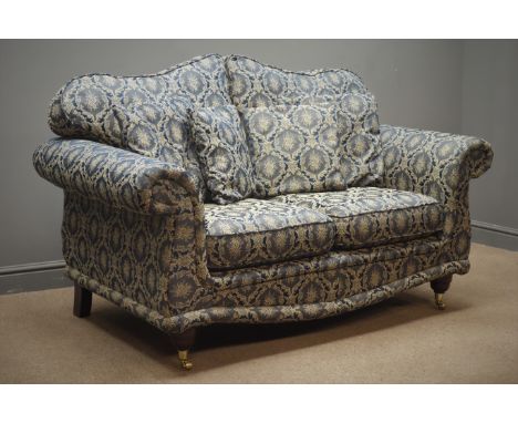 Two seat traditional style sofa floral pattern upholstery with mahogany feet on brass castors, W158cm Condition Report Click 