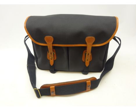 Billingham black camera bag with tan trim, two front pockets and internal divisions L46cm Condition Report Click here for fur