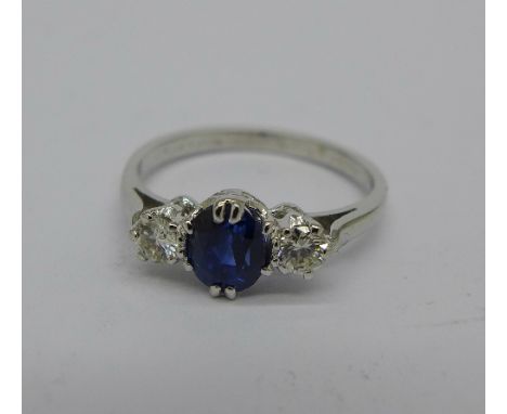 A platinum and three stone sapphire and diamond ring, tests as platinum, 2.7g, K