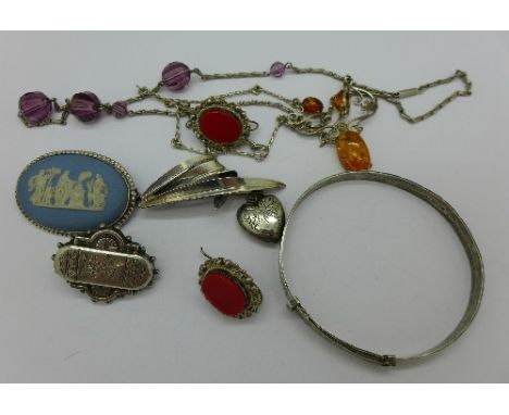 A silver bangle, Wedgwood brooch, Victorian brooch, etc.