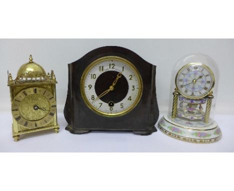 A Smith Enfield Bakelite clock, no key, pendulum or glass, a brass lantern style clock and an anniversary clock (3)