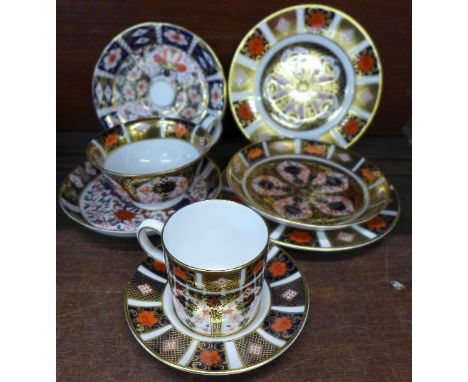 A Royal Crown Derby 1128 pattern cup and saucer, coffee can and saucer, two tea plates, seconds, and two other Royal Crown De