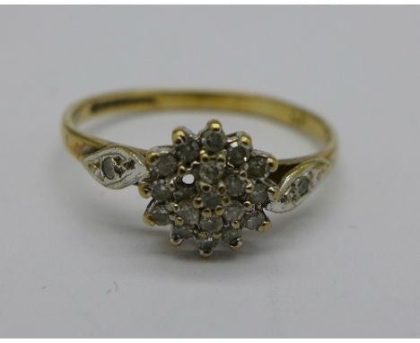 A 9ct gold and diamond cluster ring, one stone missing, 1.3g, L