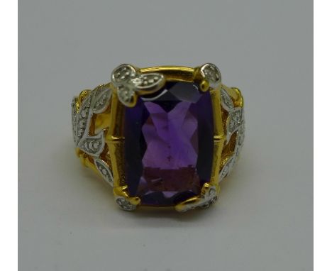 A silver gilt, amethyst and diamond ring, Q