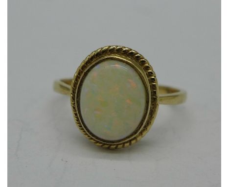 A 9ct gold and opal ring, 2.1g, P