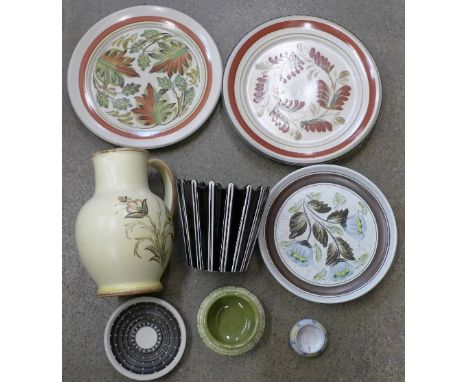 A Denby jug, five Denby hand painted plates, a black striped Sylvac planter, two pieces of Bourne Denby and a mustard pot (10