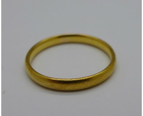 A 22ct gold wedding band, 2.1g, K