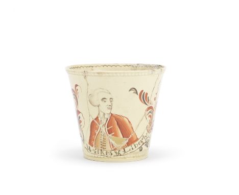 A very rare political commemorative creamware beaker, circa 1765Staffordshire or Yorkshire, of plain flared cylindrical form 