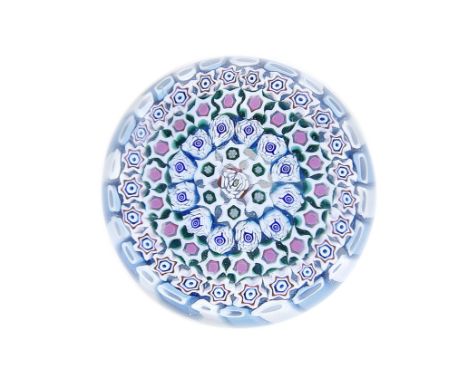 A rare European concentric millefiori basket paperweight, maker unknown, circa 1850The central white rose cane within four ro