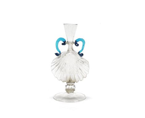 A façon de Venise vase, 17th centuryMoulded in the form of a scallop shell, the tapering cylindrical neck with a trailed verm