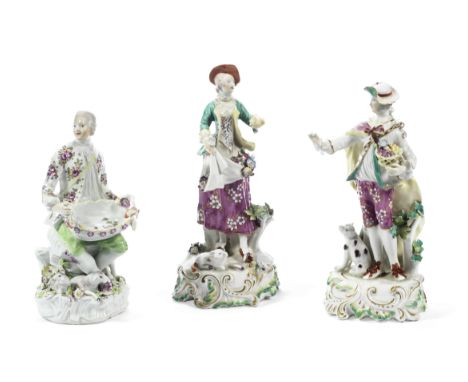 A Derby sweetmeat figure and a pair of Derby figures, circa 1756-65The sweetmeat figure of 'Pale Family' type, modelled as a 