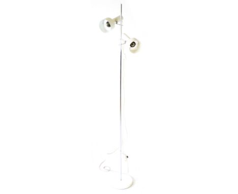 A 1970's twin spot standard lamp, the white adjustable shades on a single shaft CONDITION REPORT: Working order unknown, lead