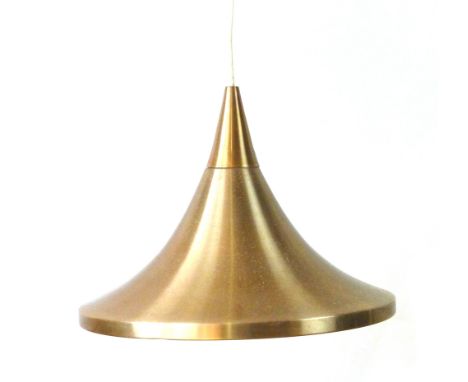 A 1970's copper coloured ceiling light with a red interior