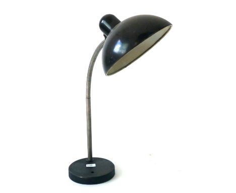 A Kaiser Idell tole adjustable swan-neck table lamp in black CONDITION REPORT: Working order unknown, lead cut