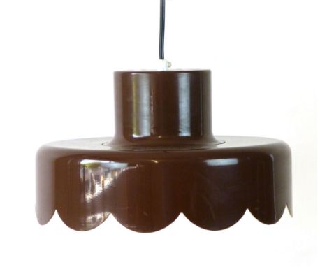 A 1970's brown ceiling light with a pie-crust border