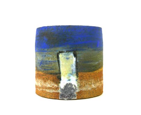 Robin Welch (b.1936-) studio pottery tea bowlOf cylindrical form, decorated with two glazed panels on a deep blue and stonewa