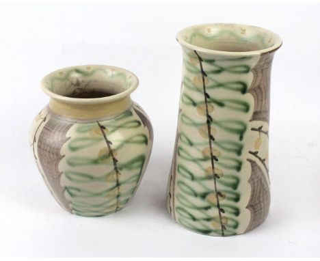 Two Susie Cooper ceramic vasesEach painted with stylised linear motifs in shades of brown, green and beige, each signed, heig