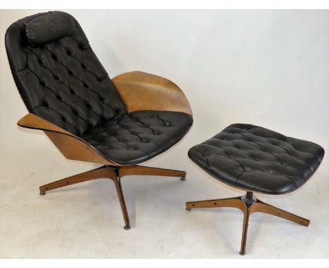 A mid Century Plycraft reclining armchair and ottoman, circa 1964Having plywood side panels with black button back leather ba