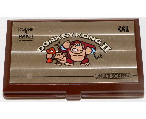 Nintendo Game & Watch. Donkey Kong IIModel (JR-55) with Brown body released March 7th 1983 part of the Multiscreen Series. Fe