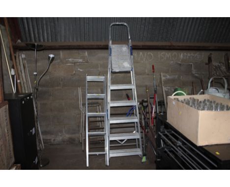 An extending ladder; together with a set of aluminium steps