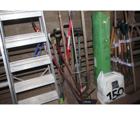 A quantity of long handled gardening tools 