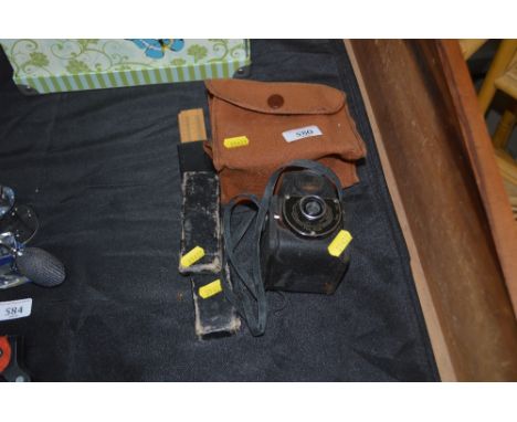 A Ful-Vue box camera with fitted case; together with a rule in fitted case 