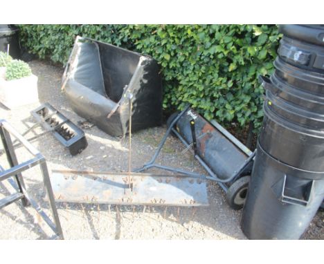 Four lawn tractor attachments