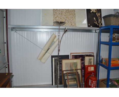 A metal uplighter with adjustable reading light 