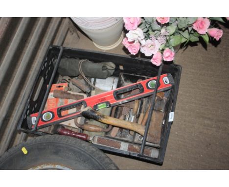 A box of various hand tools 